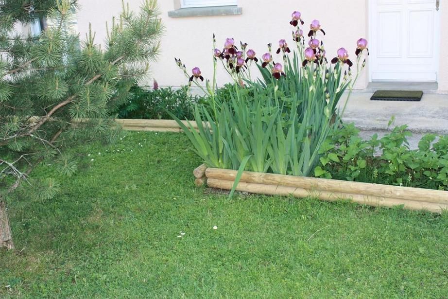 Bordure en rondin avec meplat — SNMB Menuiserie Bertin